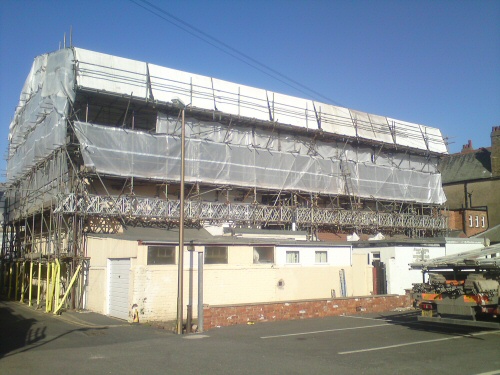 Temporary roof and access scaffolding erected to a terrace of four hotels in Blackpool